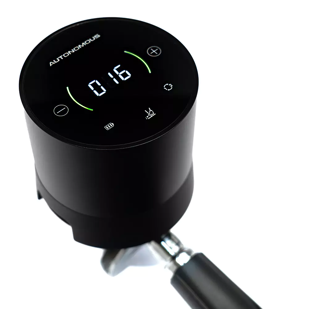 Autonomous coffee tamper digital display showing pressure value